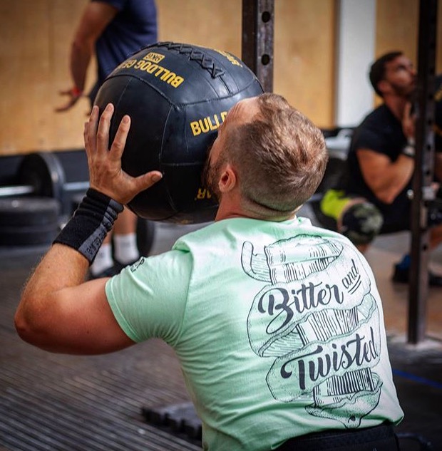 Bitter and Twisted CrossFit member wearing branded merch in the gym.