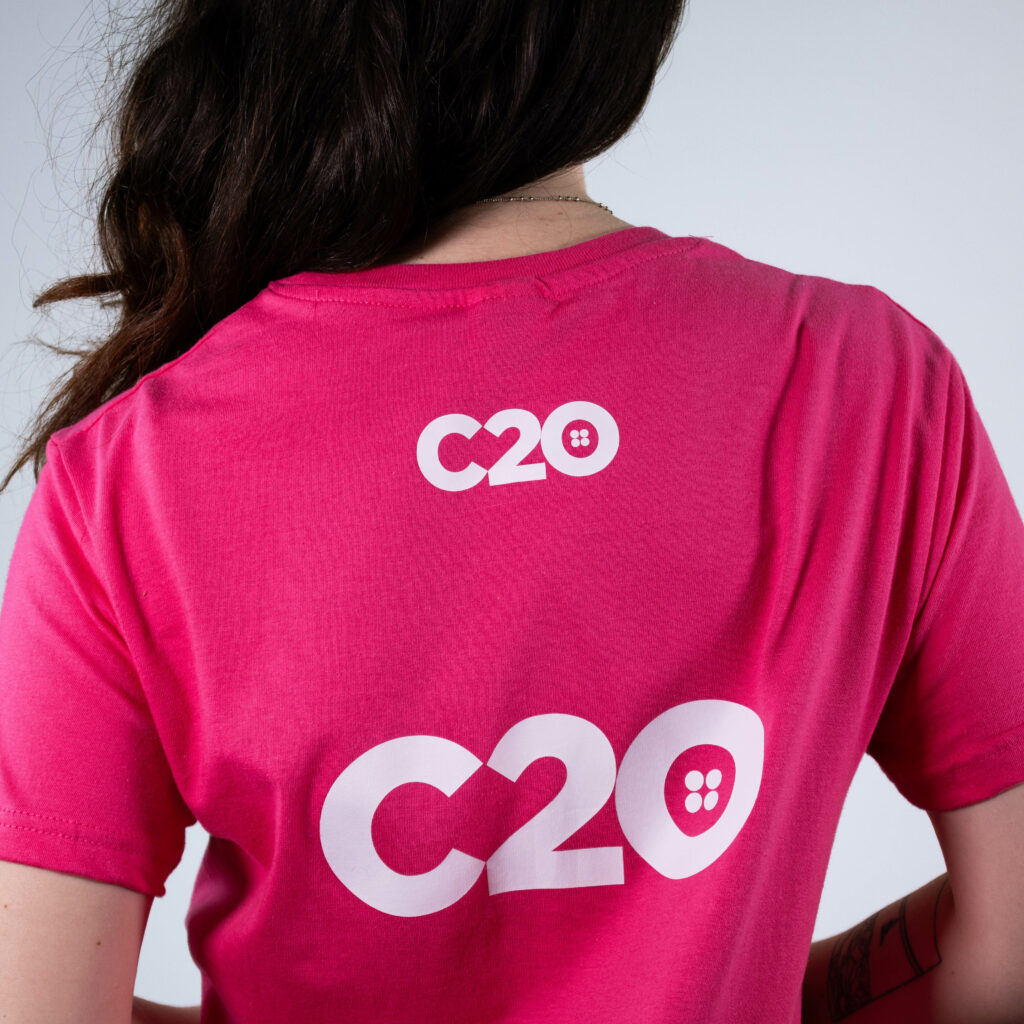 Pink t-shirt featuring Top Back logo placement.